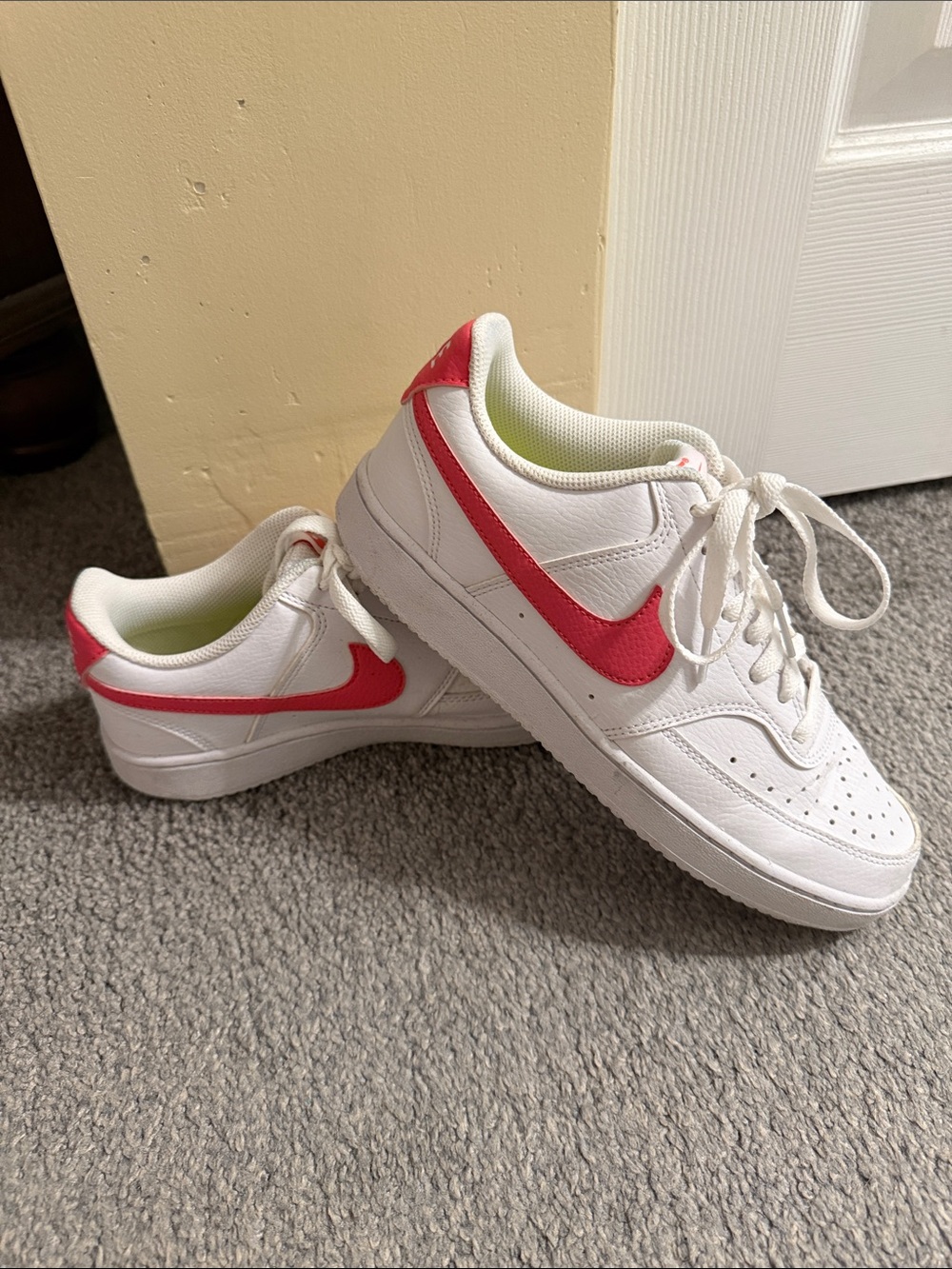 Nike White Low-Top Sneakers with Pink Swoosh